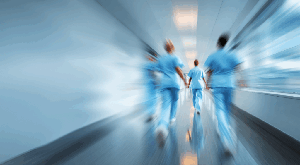 Healthcare team rushes to patient room for crisis care