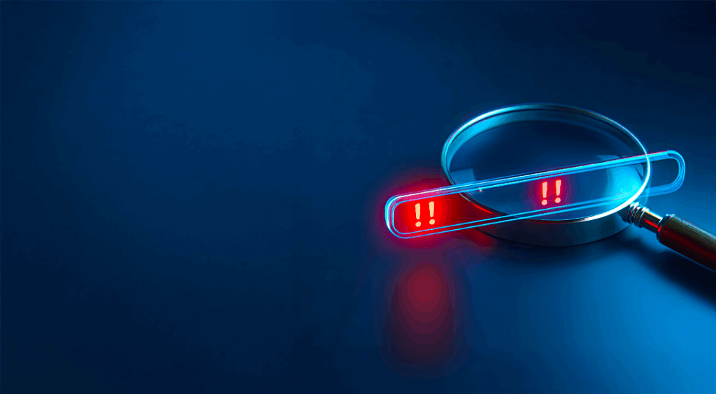 Magnifying glass shows red alerts provided by continuous monitoring